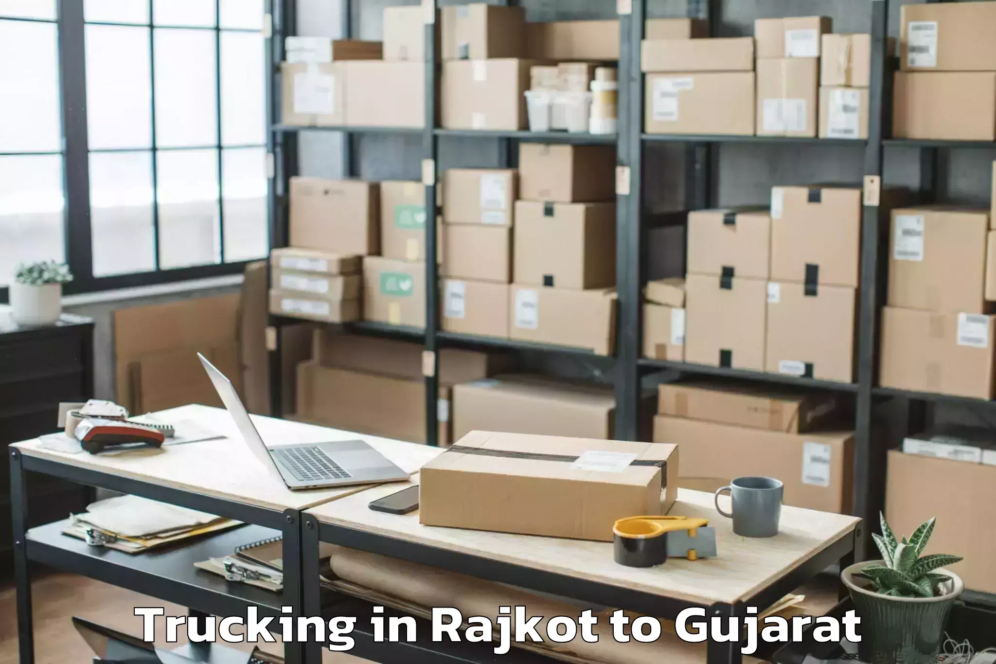 Leading Rajkot to Jhulasan Trucking Provider